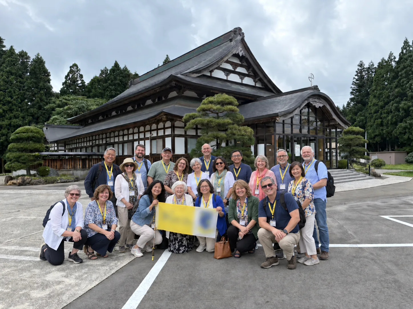 A welcoming Catholic pilgrimage group gathered outside a church in Japan